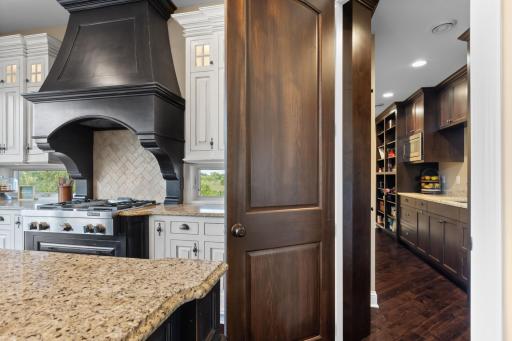 The kitchen opens to the spacious butler's pantry