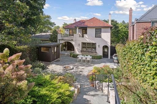 Enjoy this private backyard oasis with sauna, firepit, covered patio, outdoor balcony, private fenced in yard, stunning landscape.