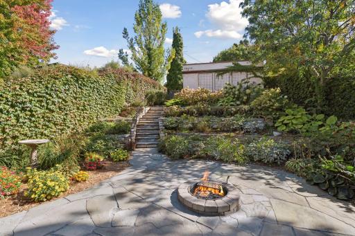 Large outdoor patio with built -in firepit