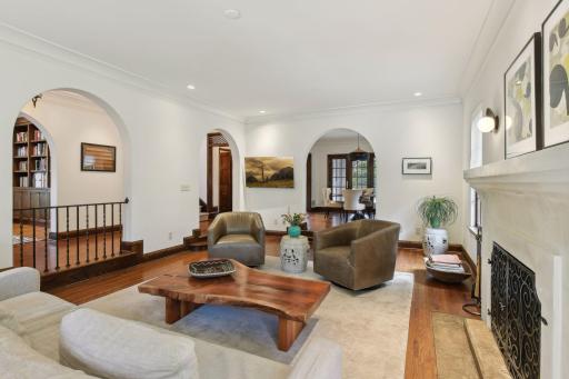 Formal living room with wood burning fireplace
