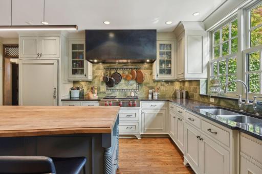 Newer industrial range hood and wolf gas stove