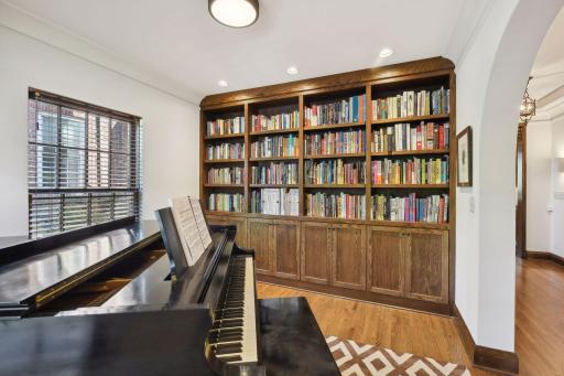 Main floor den/office, family/ tv room with new custom bookshelves