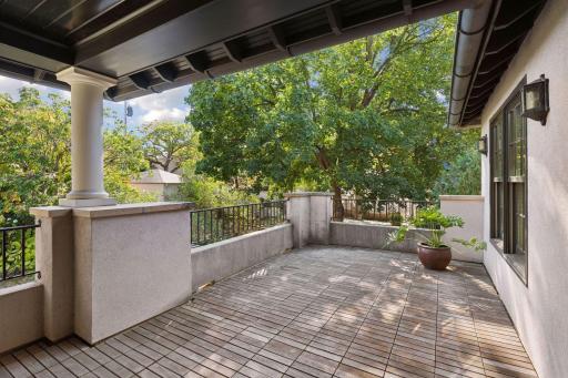 2nd floor patio area overlooking backyard, very private, covered part and uncovered