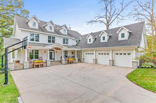 Welcome to 320 N McCarrons Blvd. This exquisite home is situated on a very private .8 acre lot with 100 feet of south facing shoreline. It offers the perfect blend of open-concept living with plenty of places to also find sanctuary.
