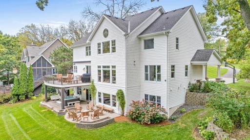 The tastefully landscaped property was created with low-maintenance materials so you can spend more time enjoying it! The upper level deck offers maintenance free decking and rails as well as an automated awning for when your prefer a little shade.
