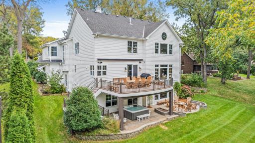 The large paver patio has a covered section with a hot tub that is great for year round use and an open air section that is the ideal spot to gather with friends and family.