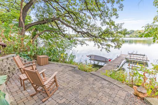 With the lake, a maintenance free deck, paver patio, designated fire pit area, lake level paver patio and a large yard; there is no shortage of places to enjoy outdoor recreation.