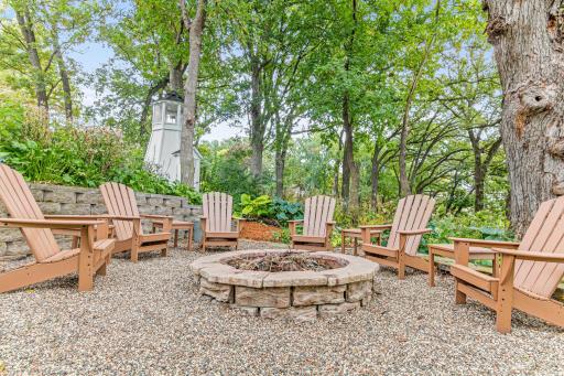 This designated fire pit area is perched just above the lake and offers fantastic views. It is not only a great spot to hang out during the spring, fall and summer, but it is also the ideal spot to warm up after ice skating on the lake.
