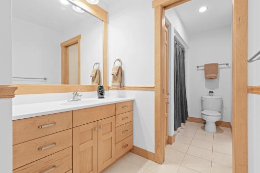 This is the private vanity area for bedroom 4 and the adjoining shared Jack and Jill bathing area which can be closed off with a pocket door.