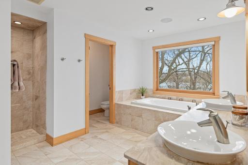 Alternate view of the bathroom. Extensive lighting options allow you to choose from a variety of lighting options including: overhead LED lighting, vanity lighting or accent lighting at the toe kick below the vanity.