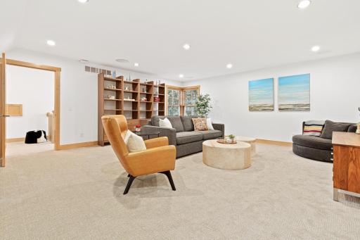 The upper level games room/family room is another great spot to unwind! This room is located at the top of the stairs and opens up to a large bonus room.