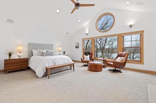 The primary suite in this home is next level fabulous! The 950+ sq/ft suite is comprised of a gorgeous bedroom with amazing windows, vaulted ceilings and a stately fireplace, a spa-like bathroom and an out of this world walk-in closet.