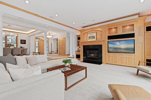 The open concept floor plan allows for the eye to travel freely from room to room, but the thoughtful architectural elements define the boundaries of each room.
