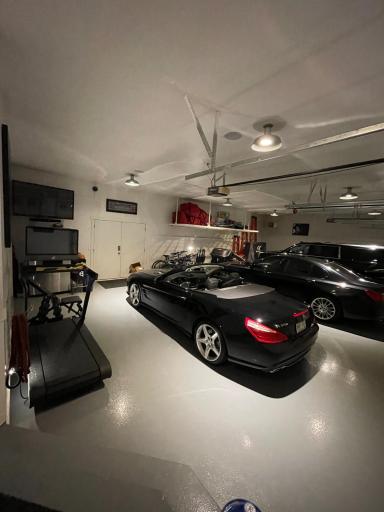 The 3+ car garage is heated with epoxied floors. Attached to the garage is a nicely equipped workroom with ample storage and running water.