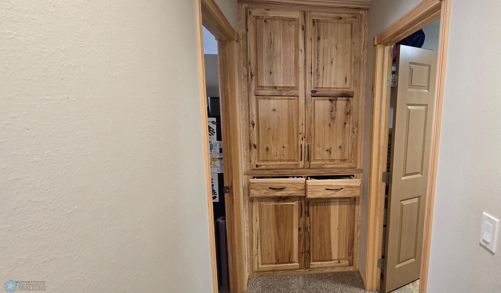Lower Level Custom Linen Storage