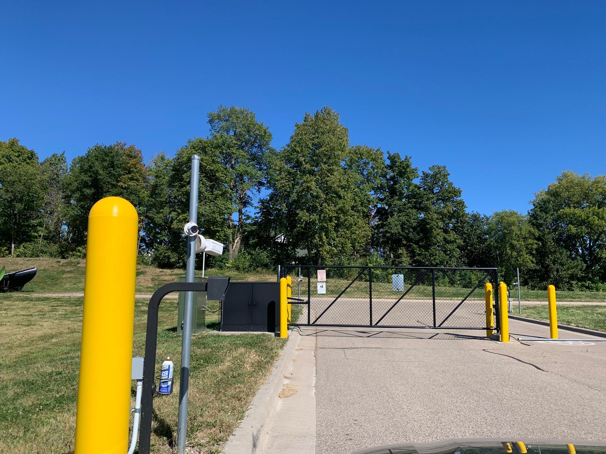 13 - Complex has secure gate entrances on both sides - north secure entrance.JPEG
