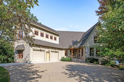 Nestled in a tranquil cul-de-sac on Burandt Lake, this custom 2-story home offers privacy, elegance, and picturesque lake views, with exquisite finishes throughout.