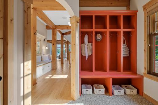 The mudroom offers built-in lockers and access to the heated garage.