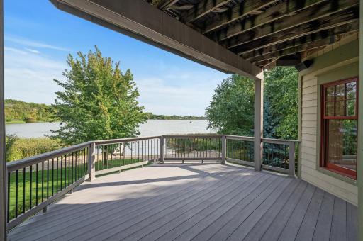 Gorgeous views of the main level deck - providing access to the lower level patio.