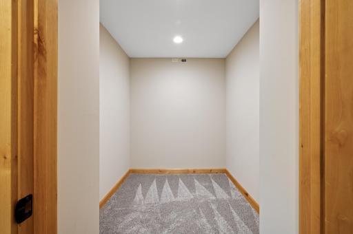 Adjacent is a spacious storage room with endless potentialâperfect for conversion into a secure safe room or a sophisticated wine cellar.