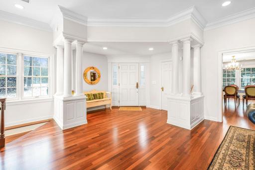 The foyer welcomes you into the charming elegance of his home.