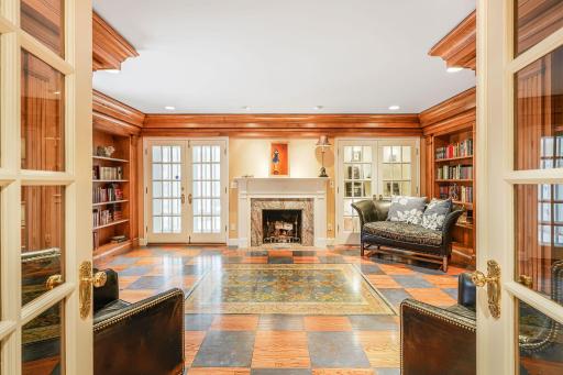 The main level study is the perfect library to enjoy a good book or use it as the perfect home office!