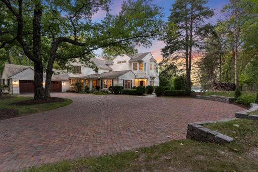 The paver driveway is a welcoming approach to this Chanhassen gem just around the corner from downtown Excelsior.