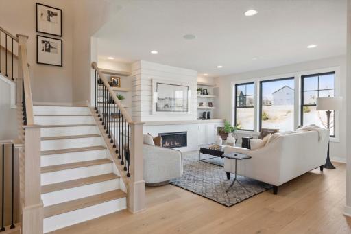 Savannah A - Photo is of like home and may not depict actual home plan. Configurations, features, materials and finishes may contain options that are not included in the price.