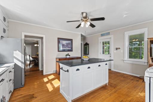 The dining room is conveniently located off of the kitchen