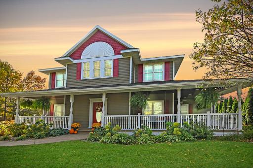 Looking for a home with a large front porch? This one is enormous and it is maintenance free.