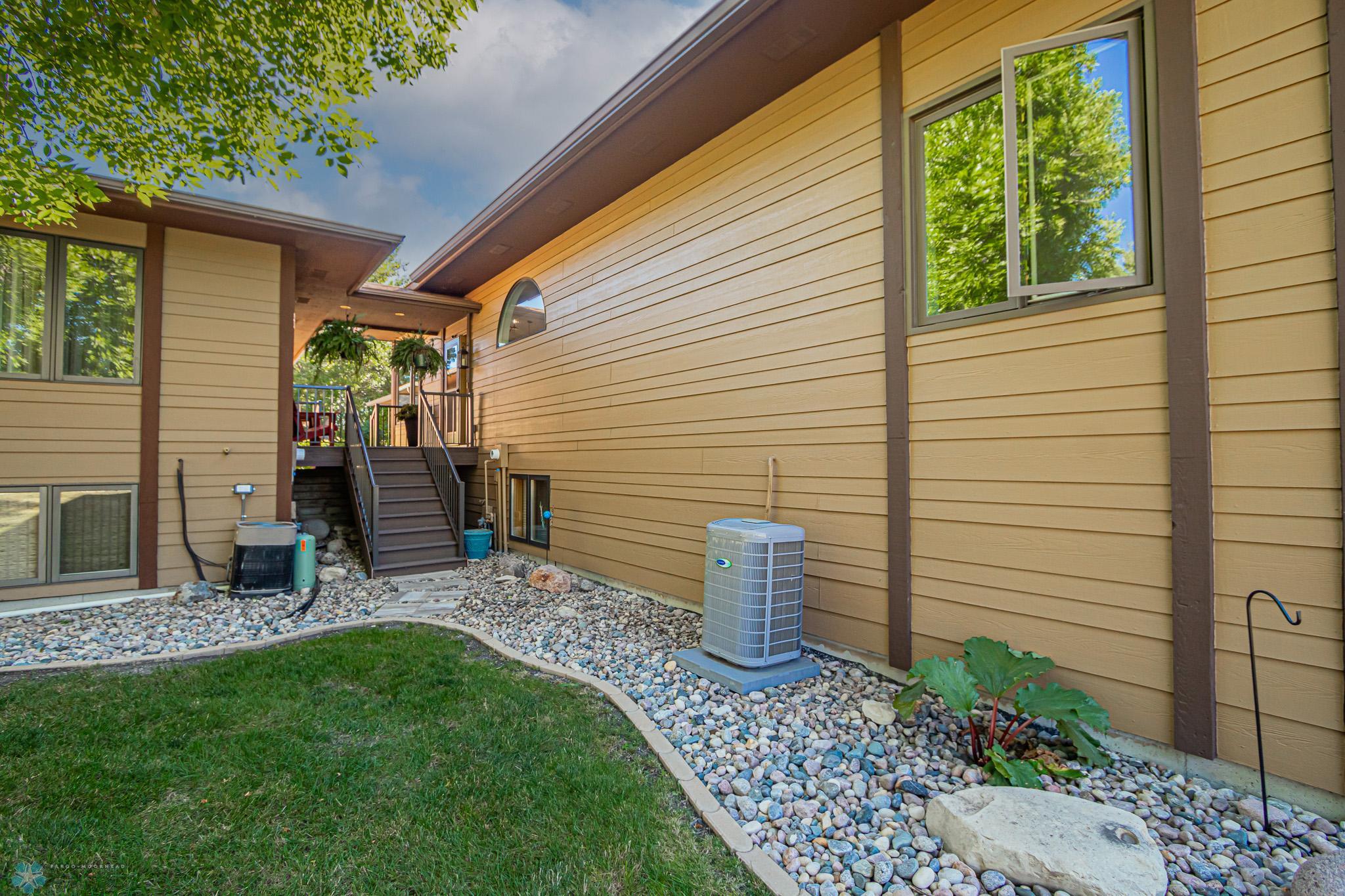 Steps from front entry to Lakeside of home