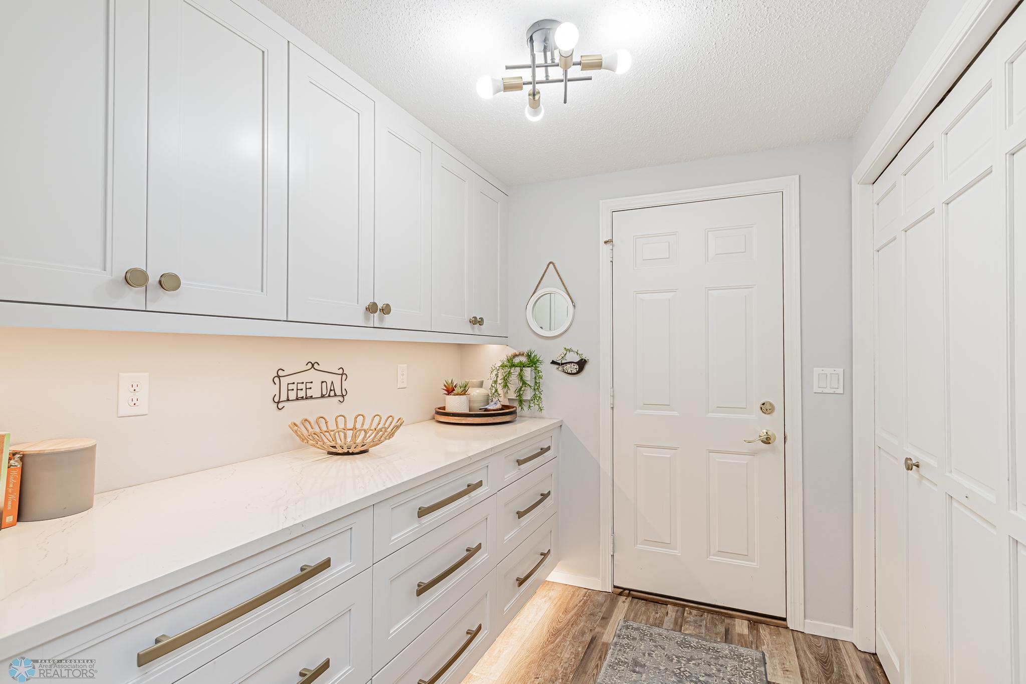 Entrance from Garage to butlers pantry and hall closet