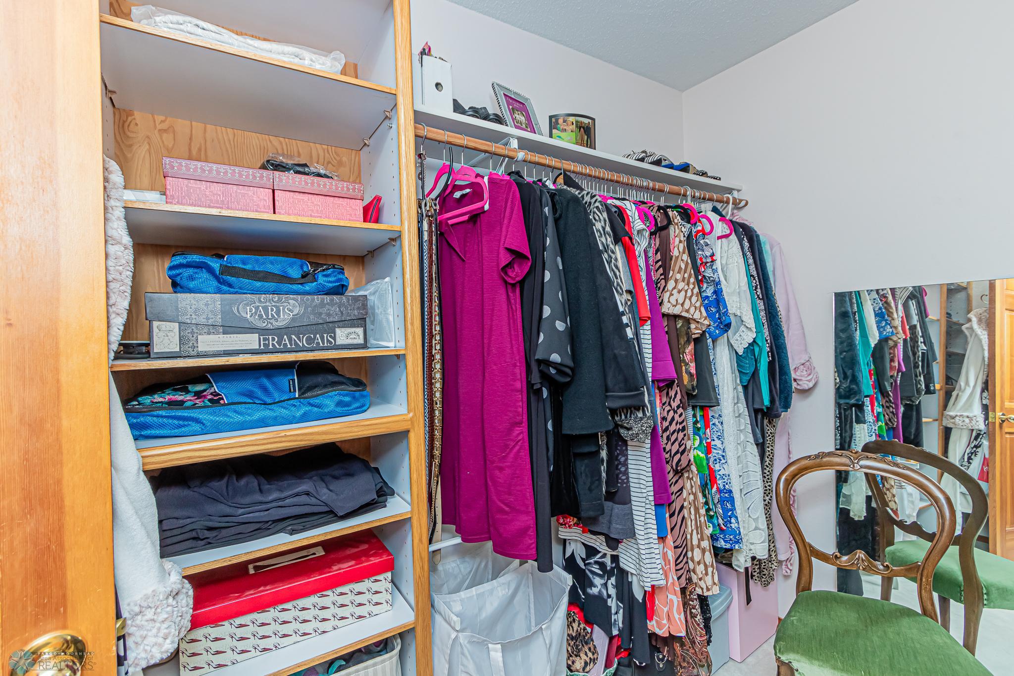 Large walk in closet in primary bedroom