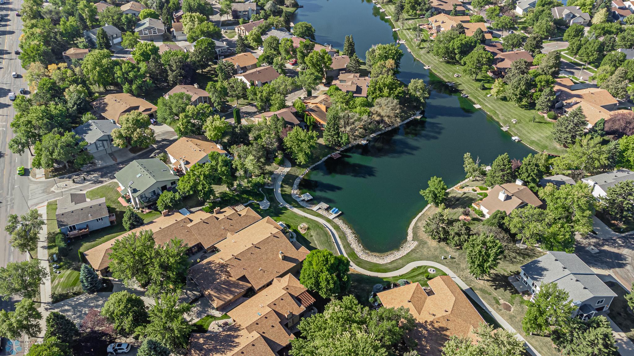 Arial view of home and Bluemont Lake