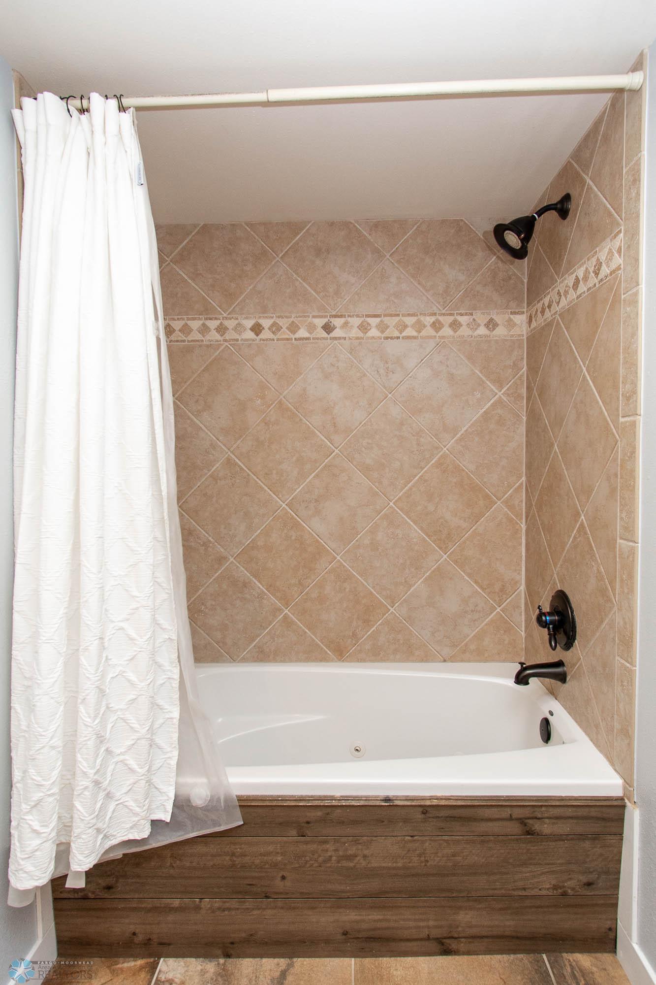 Basement Bathroom Tile Tub Surround