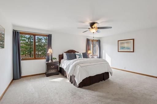 Your private retreat! Spacious primary suite with an en-suite bath.