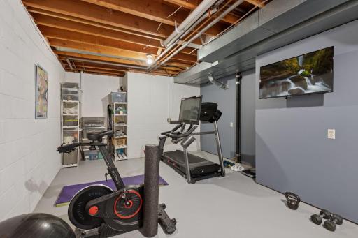 Stay active without leaving home in your dedicated lower-level exercise room.