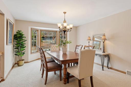 Separate dining space perfect for hosting memorable dinner parties with family and friends.