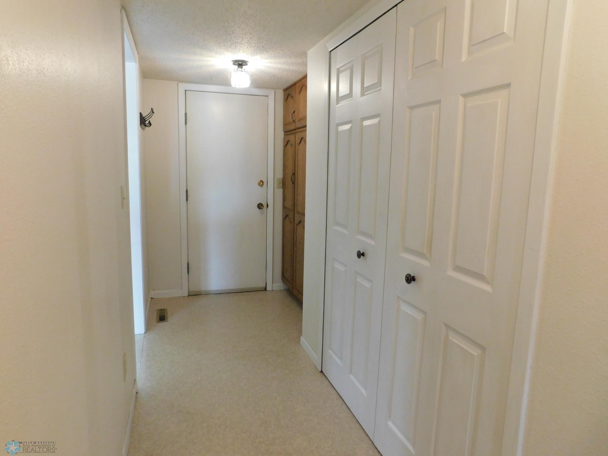 entry (large foyer with closets)