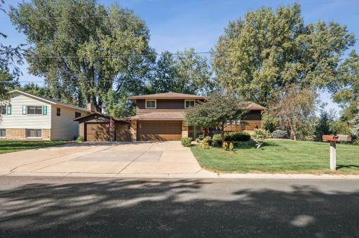 Photo for 552 13th Avenue NW, New Brighton, MN 55112 - listing #6607648 Notice the concrete drive and 3rd stall that is a huge 31' x 12'