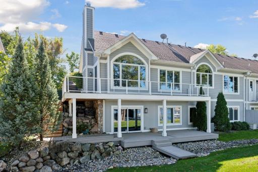 Premier end unit with main level balcony and lower level patio