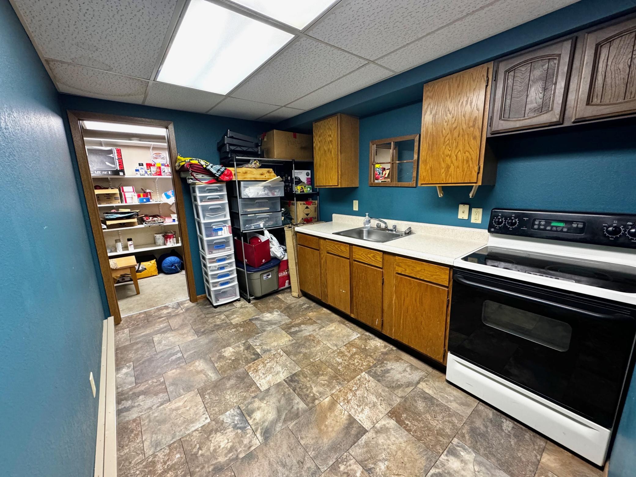 Additional kitchen & storage room in basement