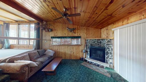 Cabin 1 -sitting rm w/cozy frplc/walkout to deck