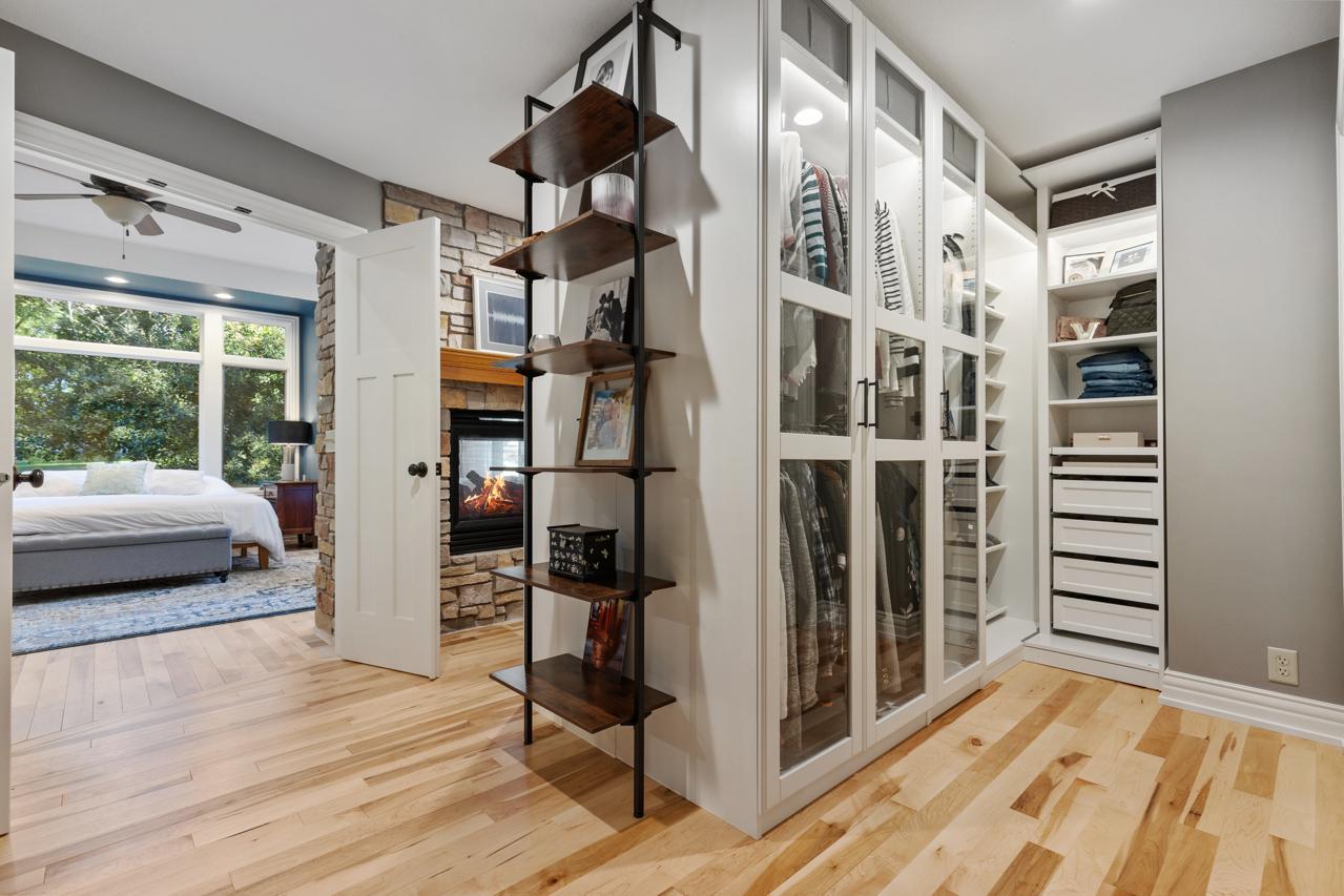 Primary Suite Walk-in Closet with Fireplace