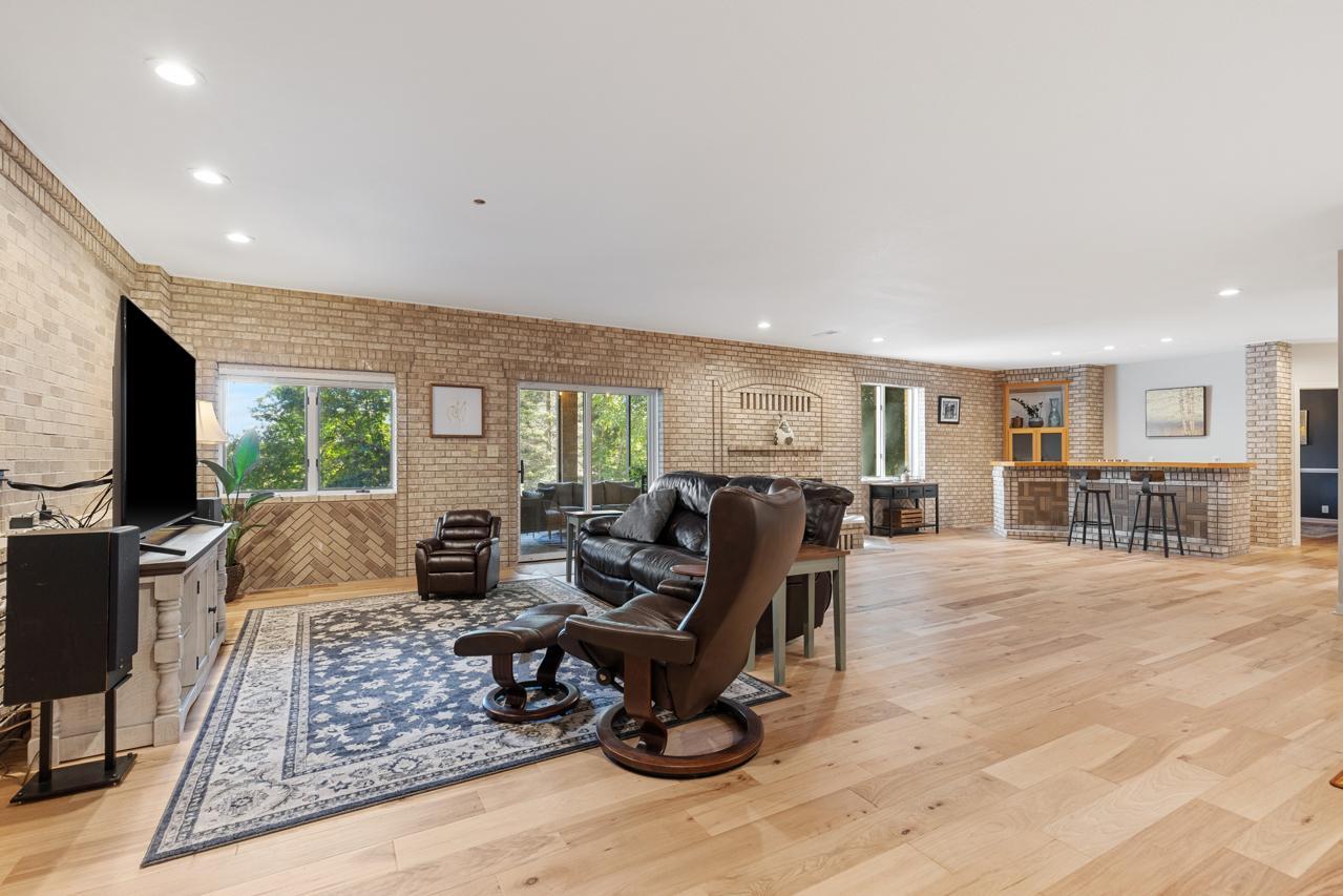 Lower Level Family Room with Wood Floors Throughout
