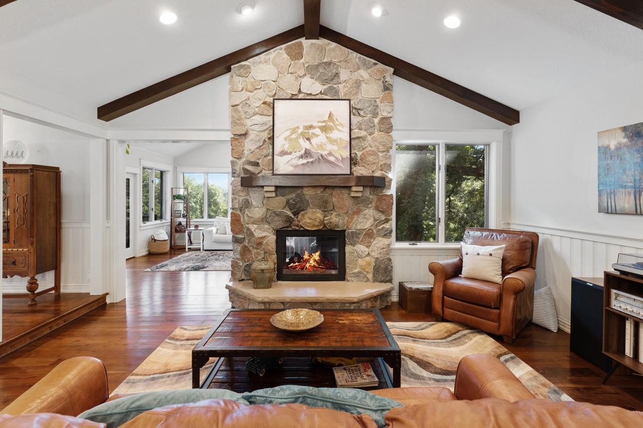 Dual Sided Fireplace connecting Great Room and Sun room