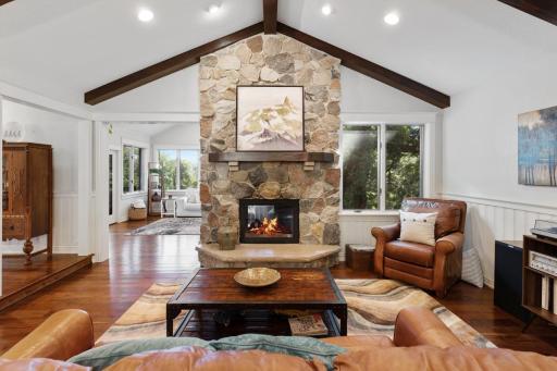 Dual Sided Fireplace connecting Great Room and Sun room