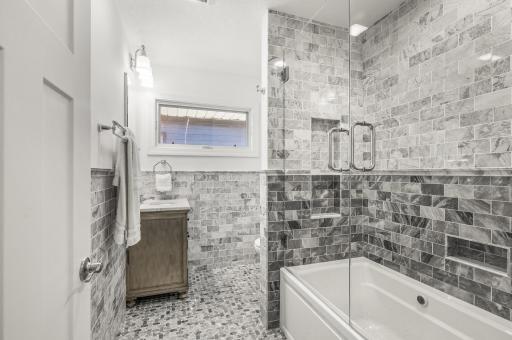 Main Level Full Bathroom includes In-Floor Heating