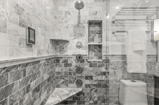 Shower features its own Digital Control System with Massage Settings and includes 9 total showerheads, including a Center Rainfall Showerhead, and Ceiling-Mounted Speakers