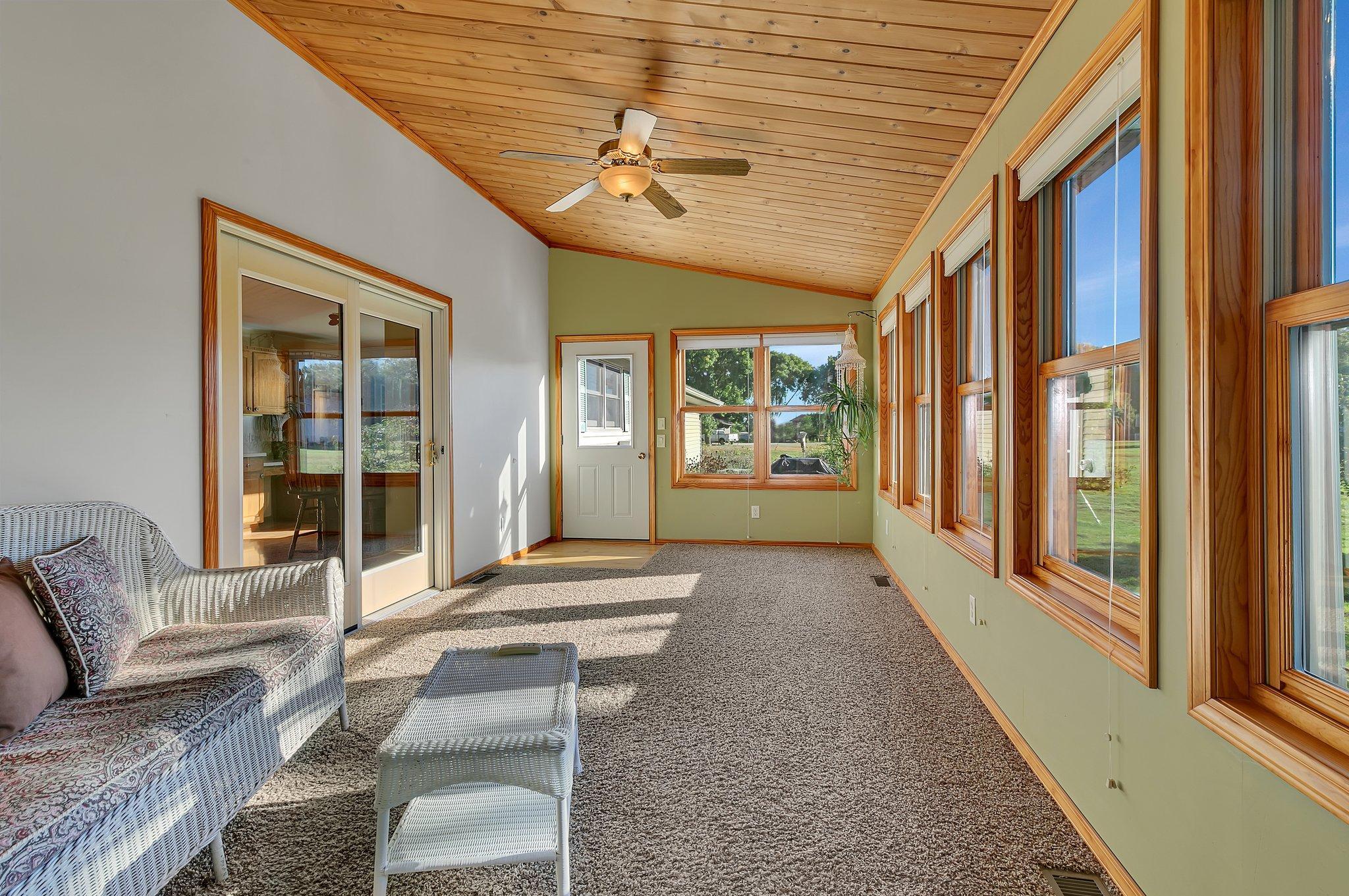 Gorgeous four season porch is a perfect place to relax.